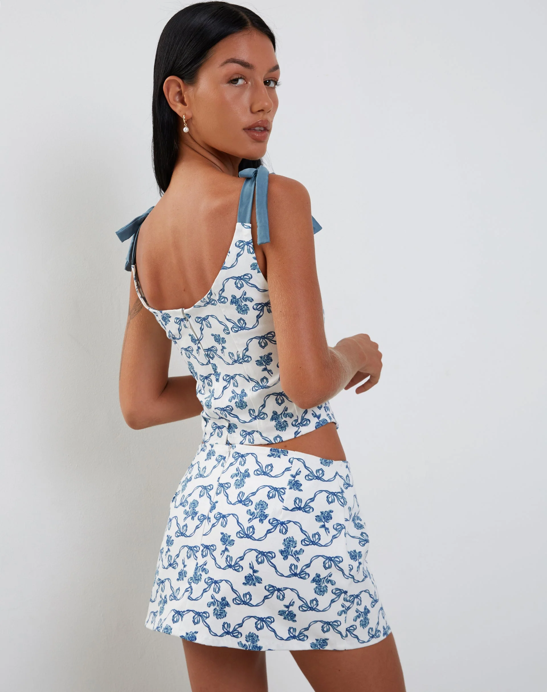 Jatmi Corset Top in White and Blue Ribbon Print - Image 7
